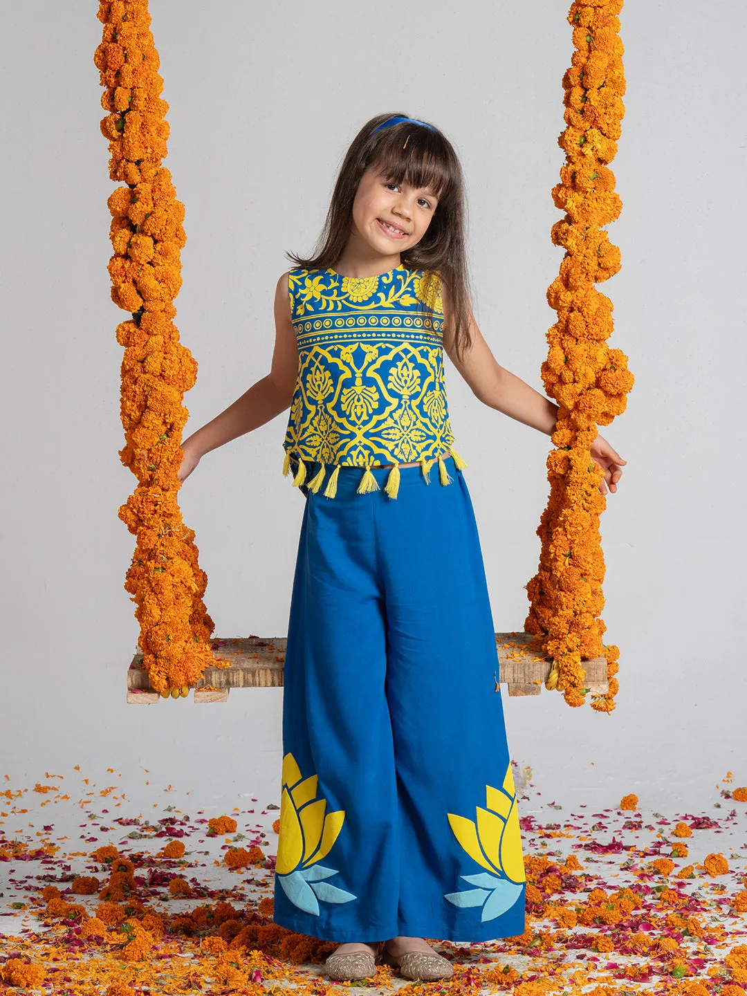 Comfortable top and pant set embellished with hand made tassel for Girls